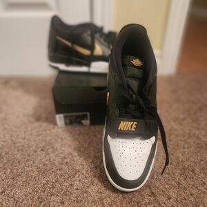 Nike Men's Black and White Sneakers with Gold Accents